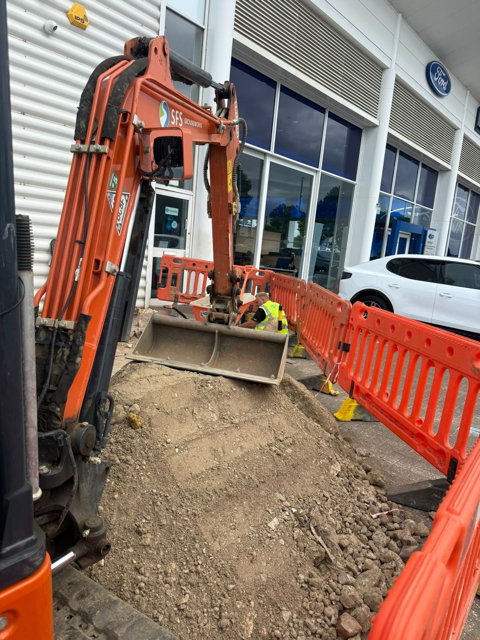 SFS Groundworks installing EV charging at a Ford main dealer